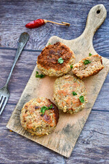 Home made  fried meatballs   on wooden rustic background.Cutlets from beef and pork meat.
