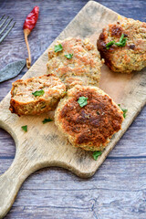 Home made  fried meatballs   on wooden rustic background.Cutlets from beef and pork meat.