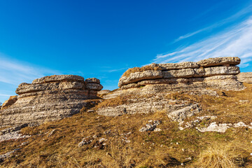 Beautiful rock karst formations in Lessinia Plateau (Altopiano della Lessinia), Regional Natural Park in Verona Province, Erbezzo, Veneto, Italy, Europe.