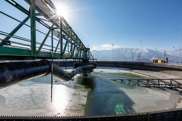 Gravity concrete thickener facilities in the mining plant. The discharge rate of underflow slurry...