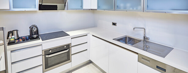 interior design clean kitchen for home, hotel and business with white cabinet