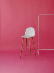 white chair pink room