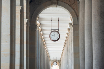 Mill colonnade clock in Karlovy Vary. Travel to Czech Republic. Beautiful architecture landmark. - obrazy, fototapety, plakaty