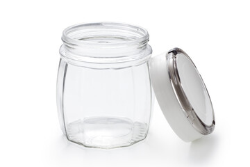 Empty glass jar with lid isolated on white background