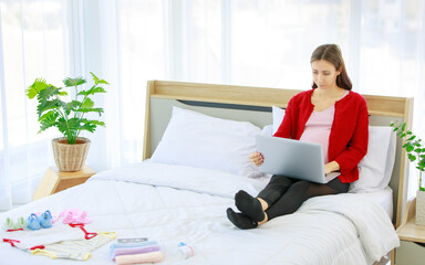 Caucasian young happy healthy female prenatal pregnant mother model in casual outfit with jacket...