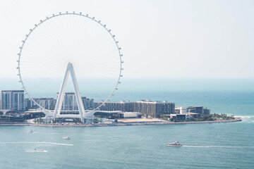 Fototapeta premium Dubai Eye Ferris wheel against blue sky