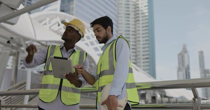 Group of businessmen and architects meeting to work on an analysis of urban building structures to be modern and environmentally friendly. Presentation of teamwork information. construction business
