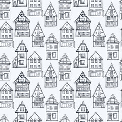 Seamless pattern with old houses. Stock illustration.