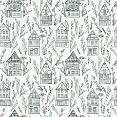 Seamless pattern with old houses and giant flowers.