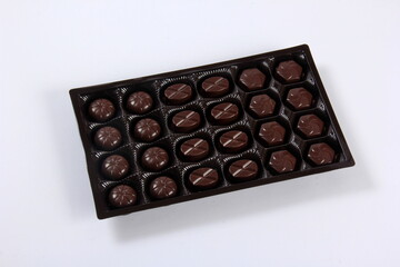 chocolate box. Assorted chocolate pralines in the box. box with chocolate isolated on white 