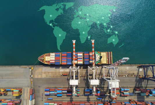 Aerial top view containers ship cargo business commercial logistic and transportation international import export by container freight cargo ship in the open seaport show ocean network on map