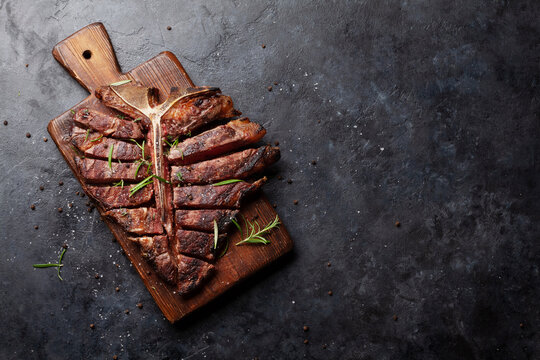 Grilled Porterhouse Beef Steak. Sliced T-bone