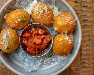 Italian traditional deep fried arancini.