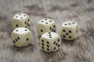 Playing cubes on a wooden table
