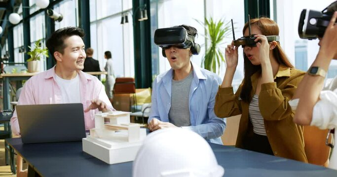 Man architect presenting building design through virtual reality glasses. group startup brainstorming idea for planning marketing strategy. business technology Metaverse. working cooperation