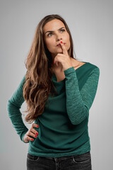 Beautiful woman with a thinking expression