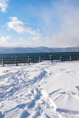 【青森県】雪が積もった冬の十和田湖
