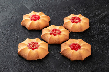 Healthy food concept. Homemade organic energy cookies on black slate stone background with copy space