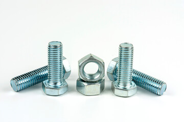 Large bolts in silver-colored metal. Fastening bolts and nuts on a white background close up