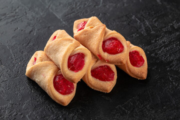 Healthy food concept. Homemade organic energy cookies on black slate stone background with copy space