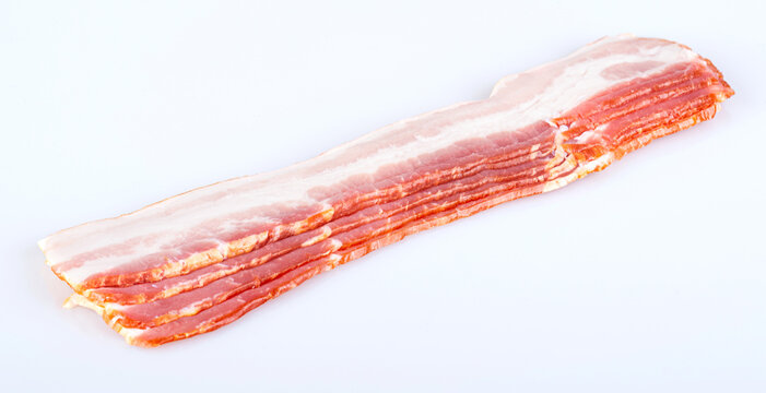 Slices of raw bacon, isolated on a white background.