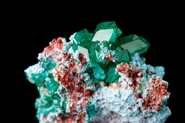 macro mineral stone Dioptase on a black background