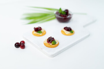 canape with cheese and jam