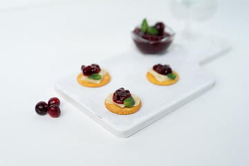 canape with cheese and marmelade