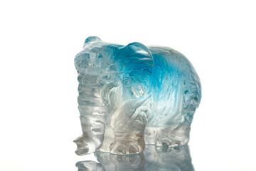 beautiful statuette elephant from the mineral topaz on a white background