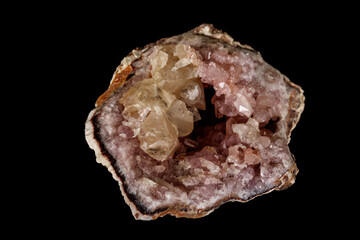 Macro mineral stone Pink Amethyst on a black background