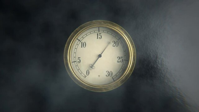 Vintage manometer or thermometer gauge under high steam pressure or temperature