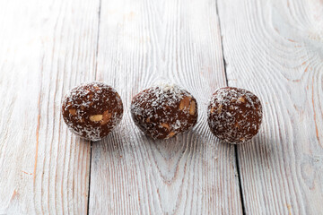 Healthy food concept. Homemade organic energy cookies on white wooden background with copy space