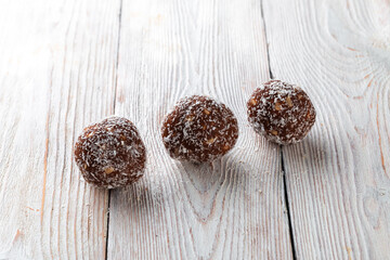 Healthy food concept. Homemade organic energy cookies on white wooden background with copy space