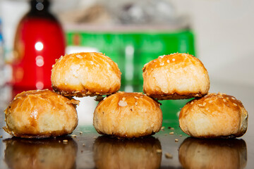 The traditional Chinese food, Shaobing in the shape of chess pieces, is placed on the table