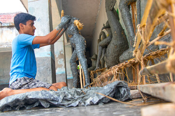 Indian Boy Making Idol Goddess