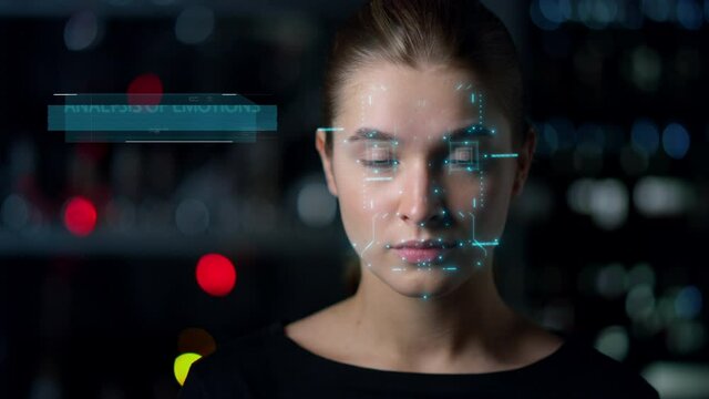 Futuristic biometrical emotions analysis. Closeup woman face biometrics research