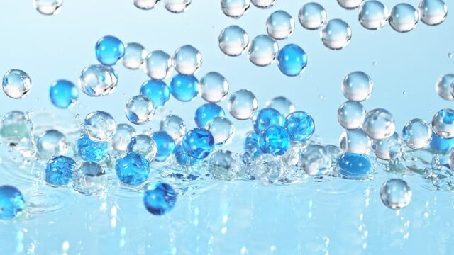 Super Slow motion Shot of Hydrogel Balls Bouncing on Glass at 1000fps.