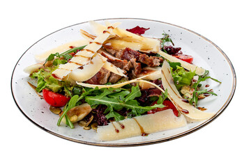 Veal and pear salad with olive-balsamic dressing. Isolated on a white background.