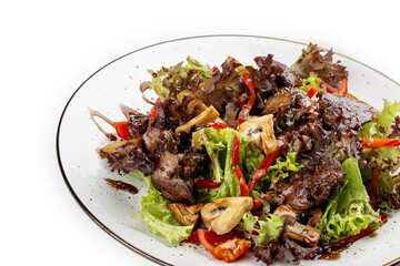 Salad with chicken liver, sweet pepper and champignons. Isolated on a white background.