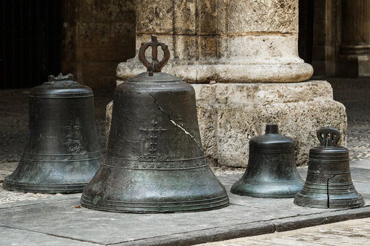 Old broken church bells on the ground