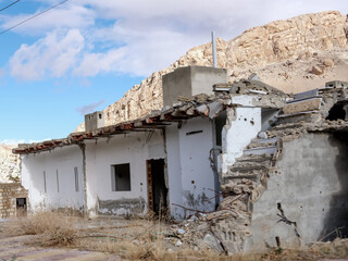 SYRIA. Maalul Monastery is located 60 km from Damascus. Nearby is the village of Kalamondin resembling an eagle's nest. The houses are built on the rocks by steps.