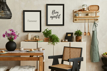 Creative and cozy kitchen interior composition with mock up poster frames, beige commode, plants,...