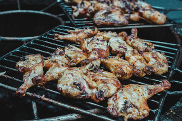 fried chicken cooking on a hot rock