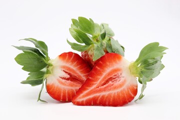 strawberries with leaves on white background