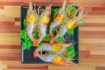 popular Thai food dish of charcoal grilled giant freshwater prawn