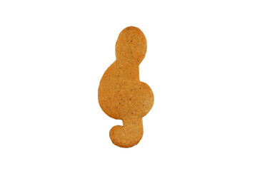 Gingerbread in a shape of treble clef isolated on a white background