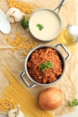 Classic Homemade Tomato Sauce and White Creamy Sauce for Pasta and lasagna in the Pan. Top View