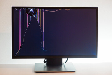 Broken LCD monitor. Cracked LCD Screen. Broken screen of a liquid crystal display, computer monitor.