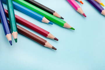 Colored pencils on bright colored background