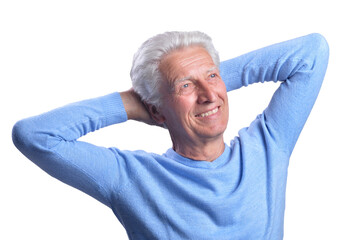 portrait of smiling senior man on white background